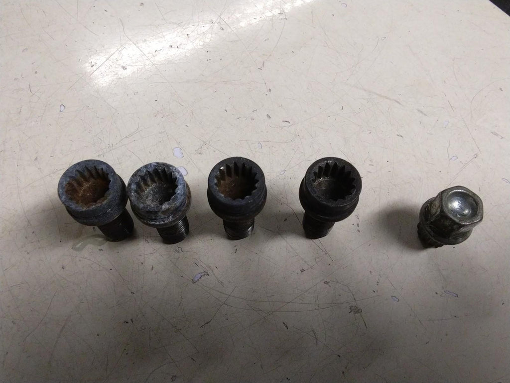 AUDI A4 B6 SET OF FOUR LOCKING WHEEL NUTS AND KEY