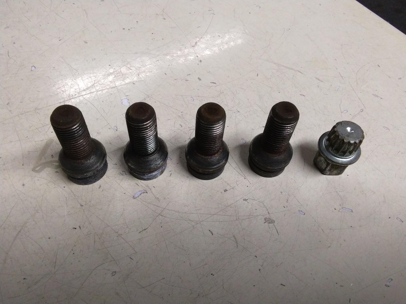 AUDI A4 B6 SET OF FOUR LOCKING WHEEL NUTS AND KEY