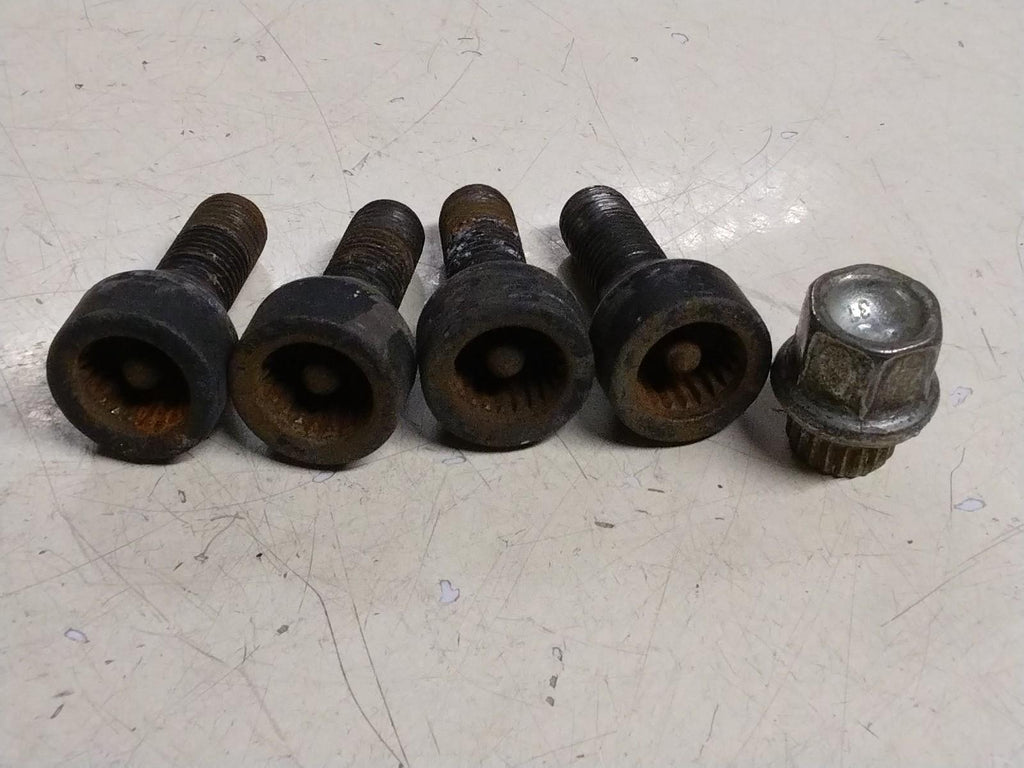 BMW E92 3 SERIES  SET OF FOUR LOCKING WHEEL NUTS AND KEY.