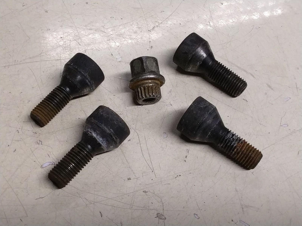 BMW E92 3 SERIES  SET OF FOUR LOCKING WHEEL NUTS AND KEY.